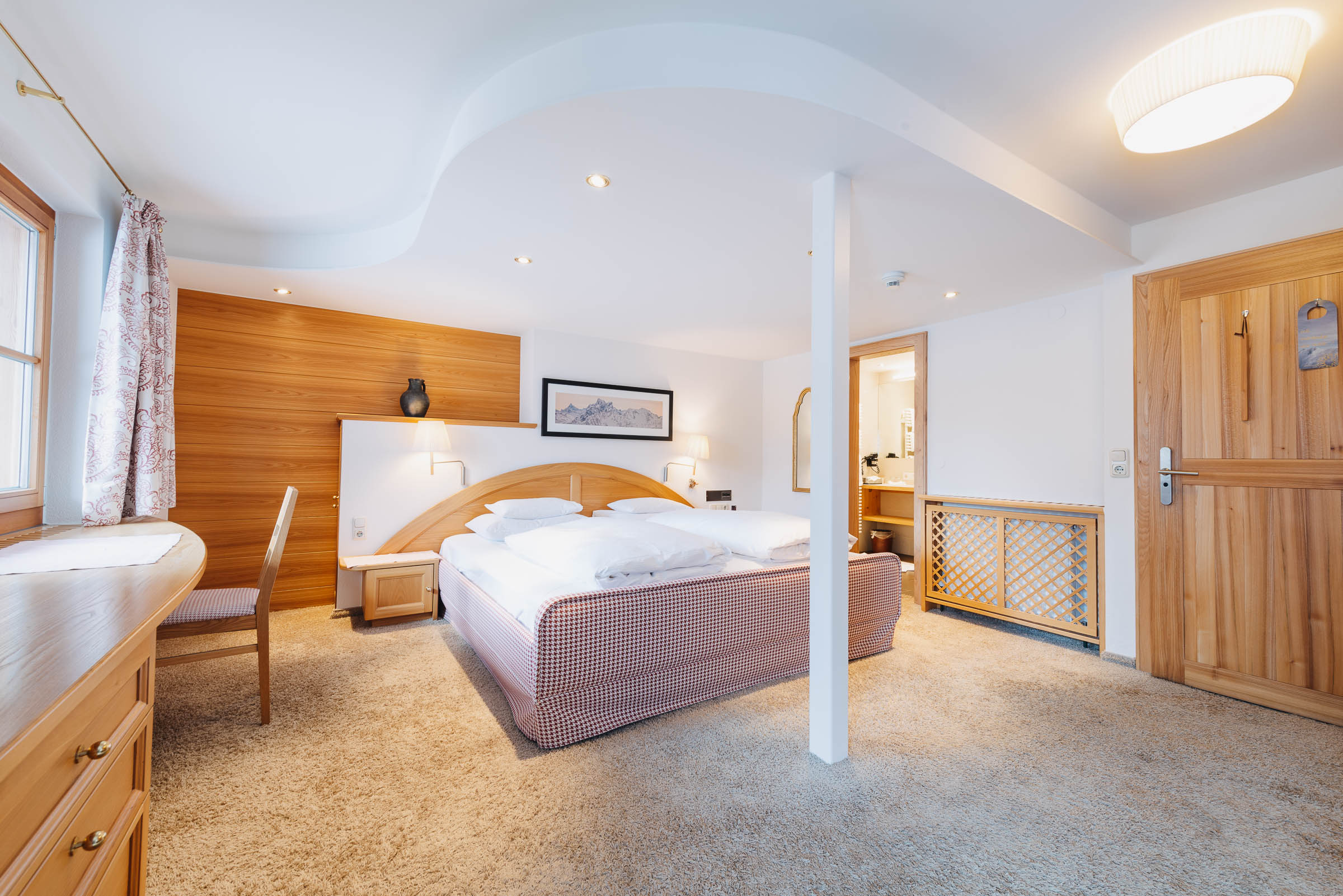 Schlafzimmer Komfortdoppelzimmer mit Balkon Das Schlafzimmer im Komfortdoppelzimmer mit Balkon